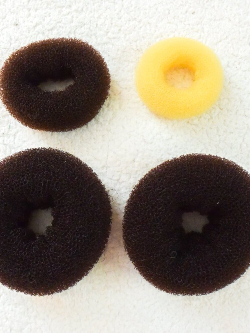 Hair Donut Bun Makers - Variety of sizes.